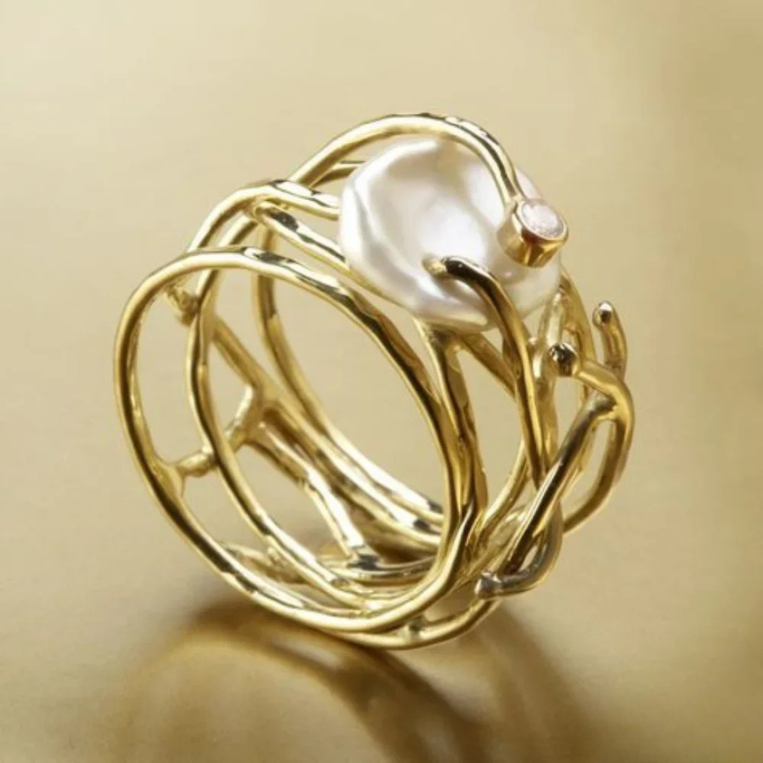 Antique Gold Ring Featuring a Pearl Detail 1