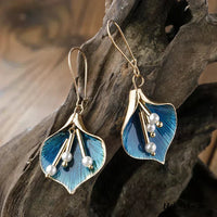 Vintage-Inspired Silver Earrings Featuring a Blue Lotus Motif 0